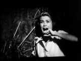 Actress Grace Kelly Screaming in a Scene from the Film 