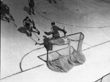 Hockey Great Jean Beliveau Taking a Shot on Net