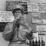 Comedian Phil Silvers Shuffling Cards on His Television Show