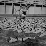 Buy Actress Jayne Mansfield Posing with Shaped Hot Water Bottles Floating around Her at Her Pool at AllPosters.com