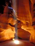Sun Shining Beam of Light onto Canyon Floor, Slot Canyon, Upper Antelope Canyon, Page, Arizona, USA