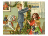 Children Hanging Christmas Holly