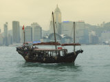 One of the Last Remaining Chinese Junk Boats Sails on Victoria Harbour, Hong Kong, China