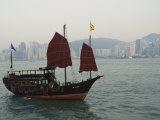 Junk Style Tourist Boat Sailing in Victoria Harbour, Hong Kong, China
