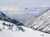 Salt Lake Valley and Fresh Powder Tracks at Alta, Alta Ski Resort, Salt Lake City, Utah, USA
