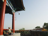 Buy Reiki Healer Regina Wei Practising Yoga at Wanchun Pavilion in Jingshan Park, Beijing China at AllPosters.com