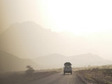 Land Cruiser Driving Along Dusty Road, Between Zagora and Tata, Morocco, North Africa, Africa