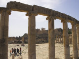 Backlit View Through Columns with Family Walking Past, Jerash, Jordan, Middle East