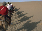 Shadows of Tourists on Camels, Dunhuang Province, China