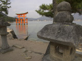 Traditional Stone Candle Stands with Floating Torii Beyond, Itsuku Shima Jinja, Honshu, Japan