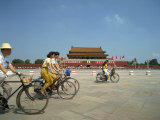 People Cycling Through Tiananmen Square Outside the Forbidden City, Beijing, China
