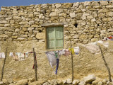 Washing Line in Front of an Old Stone Wall with Small Window at Kastri on Gavdos, Greece, Europe