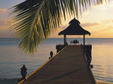 Couple Looking at Sunset on a Jetty, Maldives, Indian Ocean