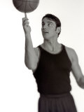 Portrait of Male Basketball Player Spinning the Ball