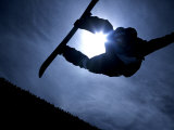 Silhouette of Male Snowboarder Flying over the Vert, Salt Lake City, Utah, USA