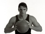 Portrait of Male Basketball Player Holding the Ball