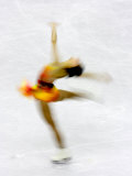 Buy Blurred Action of Woman Figure Skater, Torino, Italy at AllPosters.com