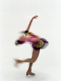 Buy Blured Action of Female Figure Skater Preforming a Spin at AllPosters.com