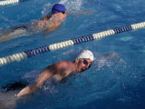 Male Swimmers Competing in a Freestyle Race Photographic Print