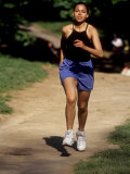 Hispanic Woman Running for Exercise, New York, New York, USA