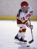 Young Girl Playing Ice Hockey