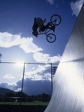 Buy Bmx Cyclist Flys over the Vert at AllPosters.com