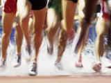 Runners Legs Splashing Through Water Jump of Track and Field Steeplechase Race, Sydney, Australia