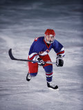 Young Ice Hockey Player in Action