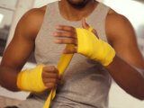 Boxer Wrapping His Hands