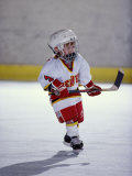 Young Ice Hockey Player in Action