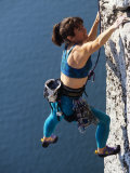 Female Rock Climber Reaching for a Grip, New Paltz, New York, USA