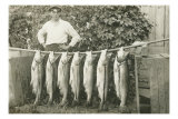 Buy Man with Fish Hanging on Pole at AllPosters.com