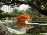 Bright orange Zi Wu Bridge, Nan Lian Garden, Hong Kong, China