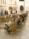 People at outdoor cafe on the Stradun, Dubrovnik, Dalmatia, Croatia