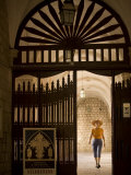 Woman leaving Franciscan Monastery, Dubrovnik, Dalmatia, Croatia