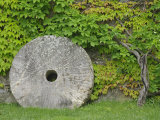 Buy Grinding stone, Castle Banfi in Tuscany region, Montalcino, Italy at AllPosters.com