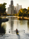 Rowers in Lincoln Park lagoon at dawn, Chicago, Illinois, USA