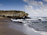 Black lava rock beach of James Bay, Puerto Egas, Santiago, Galapagos, Ecuador