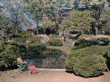 Visitors Enjoy the Quiet in a Glen Cove Garden