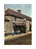 Child Stands by the Cat and the Fiddle Inn, Next to Old Roman Road