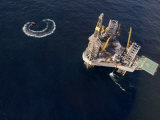 Buy Oil Rig and Safety Boat in the North Atlantic Ocean at AllPosters.com