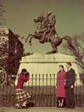 Tourists Photograph Each Other Beside Bronze Statue of Andrew Jackson