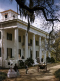 Buy People in Period Costumes Stand Outside Greek Revival Plantation Home at AllPosters.com