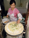 Buy Woman Sells an Egg and Scallion Pancake Called Dan Bing Fromher Home at AllPosters.com