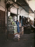 Man Stands Outside of His Quilt and Cushion Shop in Old Cairo