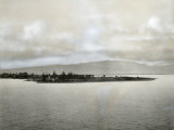 Buy Beneath the Water in Front of Landmass Lies Sunken City of Port Royal at AllPosters.com