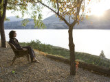 Woman Enjoys a Beautiful Afternoon by a Vineyard