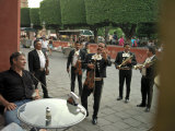 Buy Band Members of Mariachi Band Guanajuatense Play for Tourists at AllPosters.com