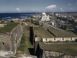 Buy Worn San Cristobal Fort Sits in Contrast to the Modern Capitol at AllPosters.com