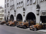 Men and Vehicles of a Fire Department Line Up for an Inspection